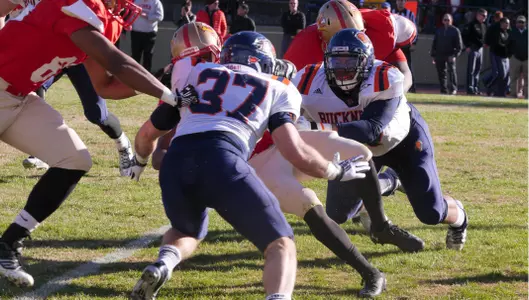 Turnovers Help Football Down VMI 35-23 to Finish Campaign 6-5
