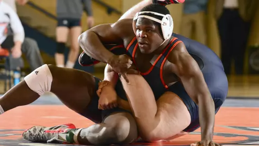 Wrestling Overcomes Early Deficit to Defeat Penn 22-13