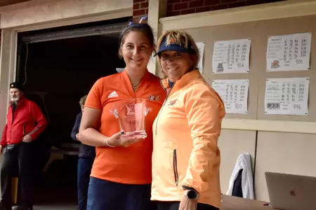 Tara Thomas, Bucknell Invitational medalist, and coach Laura Tyler-Cook