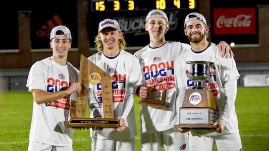 Men's Soccer Seniors with Trophies