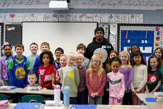 Terian Williams reading to kids for Black History Month