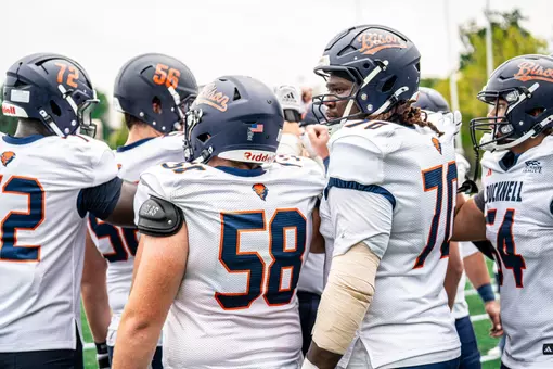 Football Offensive Line Huddle at Marist
