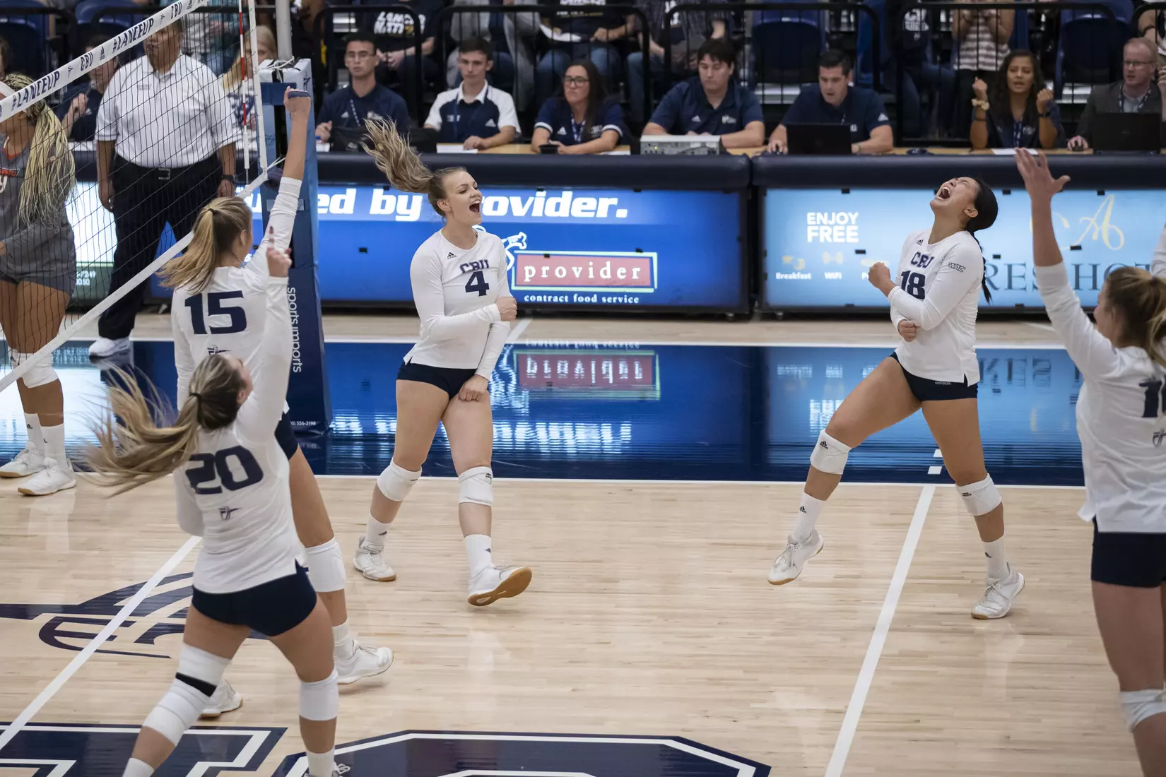 Sydney Marks and Hana Okuhara team cheer