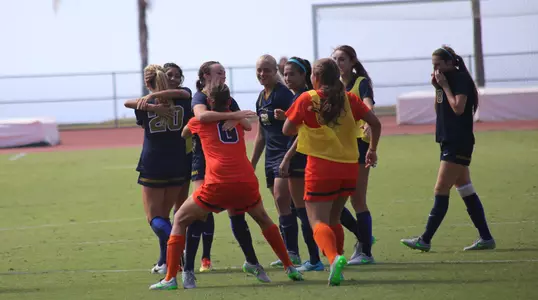 women's soccer celebrate