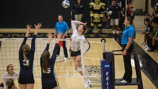 Lauren Hackett goes up for a kill.