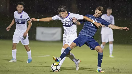 Sebastian Wiesbock battles off a Grand Canyon defender.