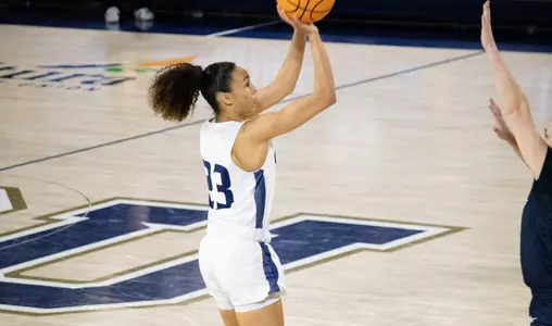 trinity with the jumper