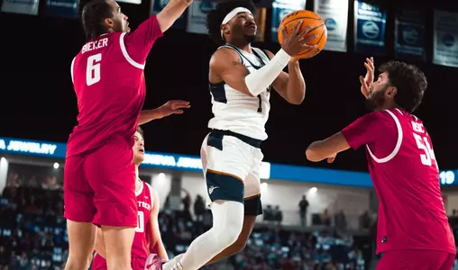 Dom glides to the Rim