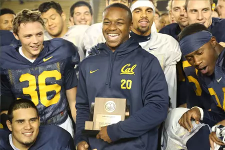 Coprich Presented with Allstate AFCA Good Works Team? Trophy