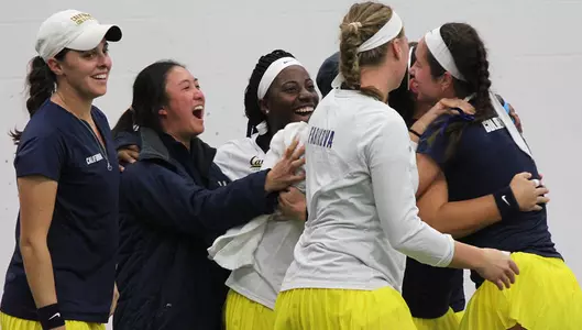 Bears celebrate after Karla Popovic (far right) clinched the semifinal win.