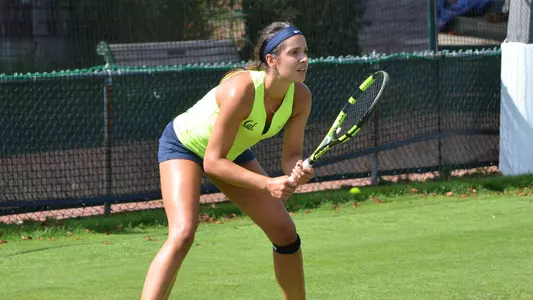 Karla Popovic won in singles and doubles on the first day of the Hall of Fame tournament.