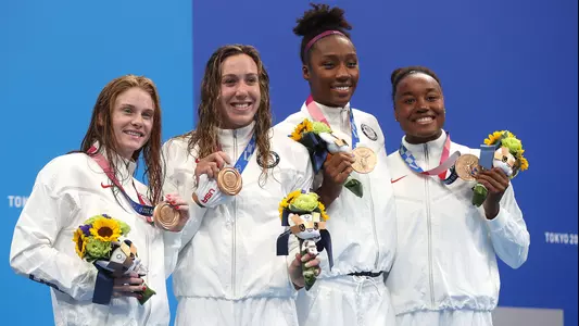 Abbey Weitzeil, second from right, 400 free relay bronze