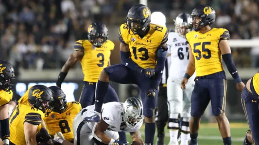 Miles Williams defense celebrate vs. Nevada 2021