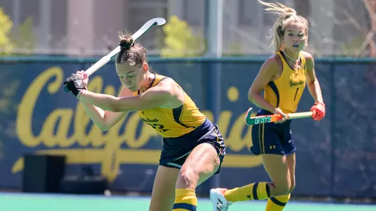 September 04, 2022; Berkeley, California, USA; Field Hockey; California Golden Bears defender Jane Onners (22) and forward Kiki de Bruijne (1) against the Indiana Hoosiers during the overtime period at Underhill Field. (Photo credit: Robert Edwards/KLC fotos)