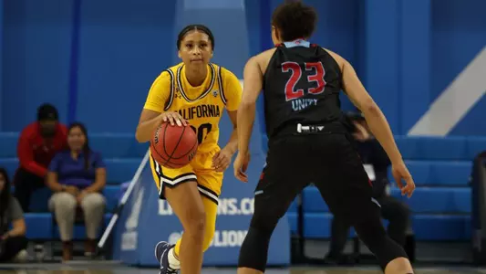 Jayda Curry dribbles against LMU