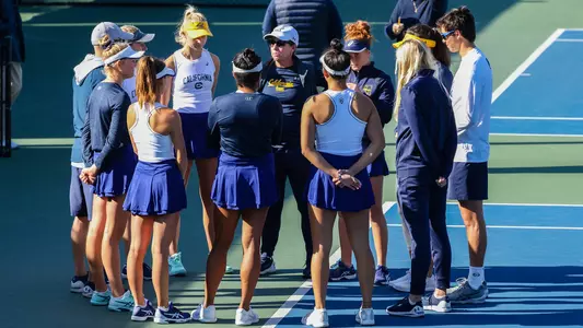 Team huddle in match vs. Princeton