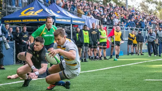 Oliver Newall scores a try against Army.