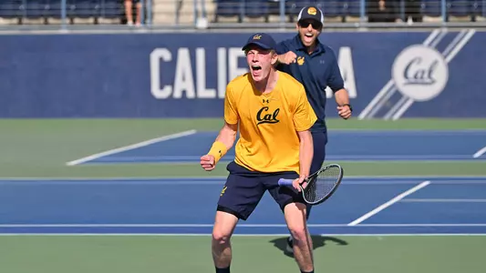 Carl Emil Overbeck celebrates clinching Cal's 4-3 win over No. 10 USC