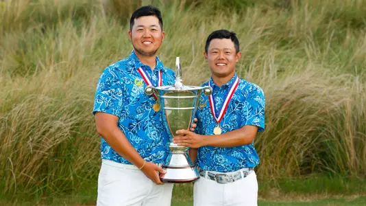 Sampsonyunhe Zheng, left, and Aaron Du pose with the U.S. Amateur Four-Ball Championship Trophy after winning the 2023 U.S. Amateur Four-Ball at Kiawah Island Club (Cassique) in Kiawah Island, S.C. on Wednesday, May 24, 2023. (Chris Keane/USGA)