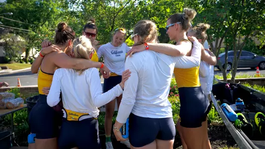 Varsity 8 team huddle