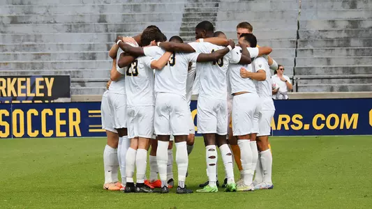Team huddle during FDU game