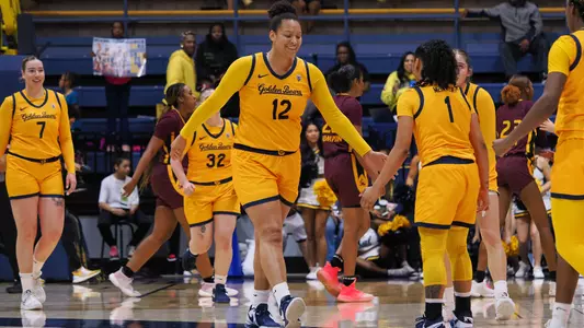 Ila Lane celebrates with teammates