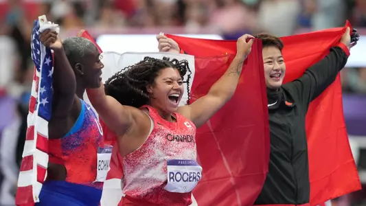 Aug 6, 2024; Saint-Denis, FRANCE; Gold medalist Camryn Rogers (CAN), silver medalist Annette Nneka Echikunwoke (USA) and bronze medalist Jie Zhao (CHN) celebrate after the women's hammer throw final during the Paris 2024 Olympic Summer Games at Stade de France. Mandatory Credit: James Lang-USA TODAY Sports