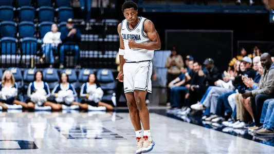 Dai Dai Ames cheers after hitting another 3-pointer vs. Cal State Fullerton at Haas Pavilion
