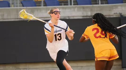 Emily Moes looks to score against USC.