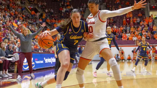 Cal WBB: Marta Suarez drives against Virginia Tech
