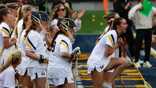Cal lacrosse players celebrating