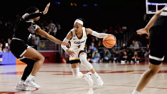 Cal WBB: Kayla Williams drives against Mississippi State