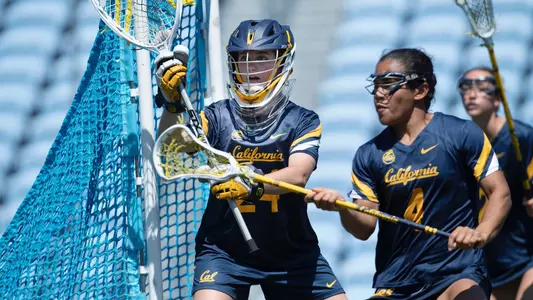 Cal goalie Chloe Rand looks to defend the net.