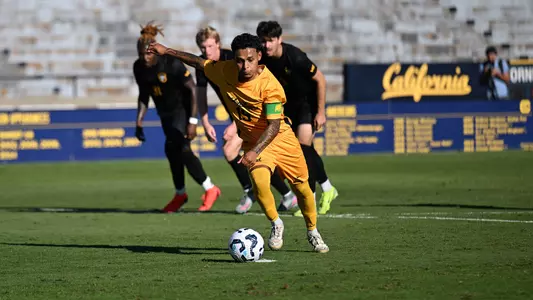 Captain Alfredo Ortiz scores a penalty kick against USF