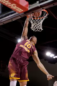 Austin Stewart dunks the ball.