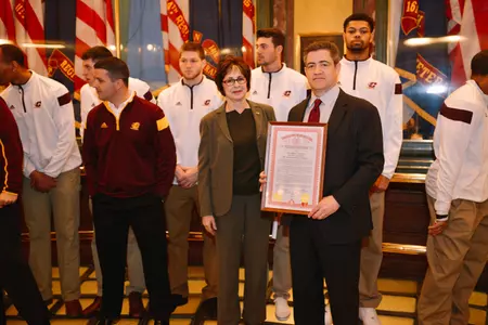 State Sen. Judy Emmons and coach Keno Davis