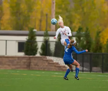 CMU's Madison Pogarch goes high into the air to head a ball in Sunday's 1-0 MAC Tournament quarterfinal victory over Buffalo.