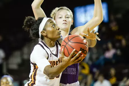 Jewell Cotton eyes the basket in CMU's 81-71 win over Furman on Friday at McGuirk Arena.