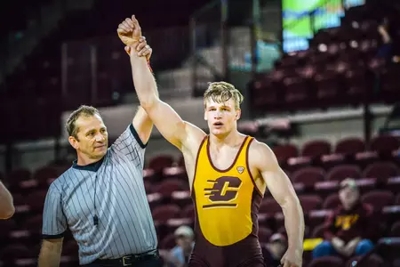 C.J. Brucki (right) was one of six CMU wrestlers to be crowned a champion Sunday at the Michigan State Open.