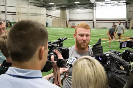 CMU quarterback Cooper Rush addresses the media.