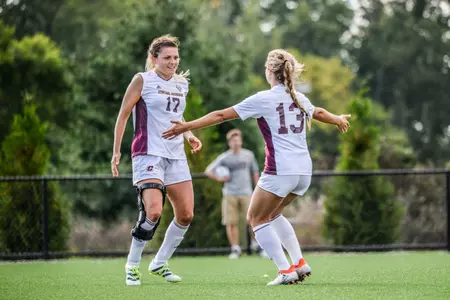 CMU's Taylor Potts (17) is greeted by teammate Shannon Magnan Sunday after Potts scored in a 1-0 win over Oakland.