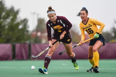 Emily Barber (left), one of six CMU seniors playing her final home game, chases down the ball on Tuesday in the Chippewas' nonconference game with Michigan.