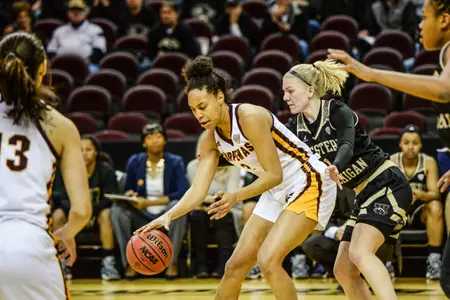 CMU senior Tinara Moore, who last year was named the MAC Defensive Player of the Year, is joined by teammate Presley Hudson on the five-player Preseason All-MAC West Team.