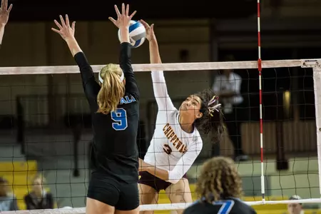 Freshman Kalina Smith (right) recorded a team-high 16 kills in CMU's five-set come-from-behind win at Ball State on Friday.