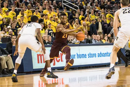 CMU's Cecil Wiliams drives to the basket in the Chippewas' 72-65 loss on Monday to Michigan at Crisler Center.