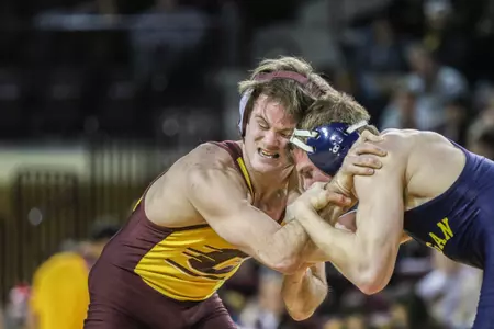 Senior Colin Heffernan (left) and his CMU teammates will wrestler Michigan State on Friday (7 p.m.) in their home-opening dual meet at McGuirk Arena.