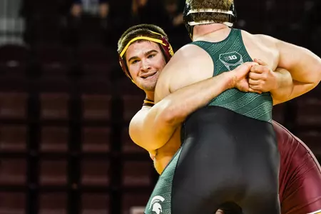 CMU redshirt freshman Matt Stencil locks in on his opponent during the 285-pound match Friday at McGuirk Arena. Stencil won on a first-period pin, one of two pins recorded by the Chippewas in the dual-meet victory over Michigan State.