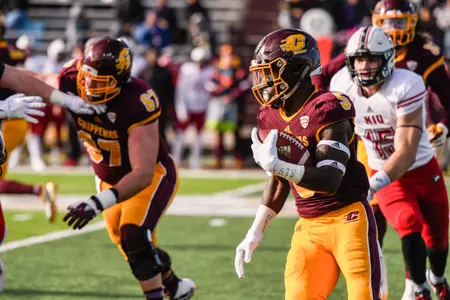 Jonathan Ward (5) ran for 159 yards and scored twice as CMU overcame a 17-0 halftime deficit on Friday in beating Northern Illinois, 31-24, at Kelly/Shorts Stadium.