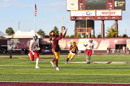 CMU senior Corey Willis (8) gathers in the game-winning TD pass in the Chippewas' 31-24 victory over Northern Illinois last week at Kelly/Shorts Stadium.