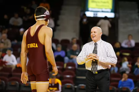 Tom Borrelli (right) enters the 2017-18 season with potentially one of his best teams in his 27 years in charge of the CMU wrestling program.